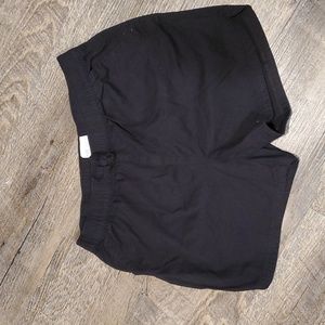 Black shorts with pockets in front.
